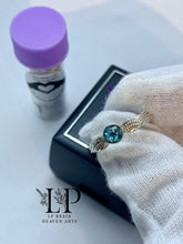 Load image into Gallery viewer, Angel wings ring in silver (now with a heart middle shape)