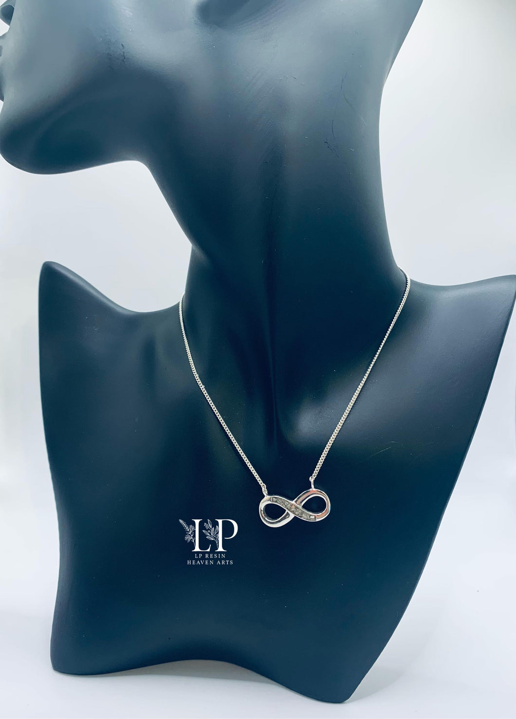 The infinity pendant with fixed adjustable chain silver