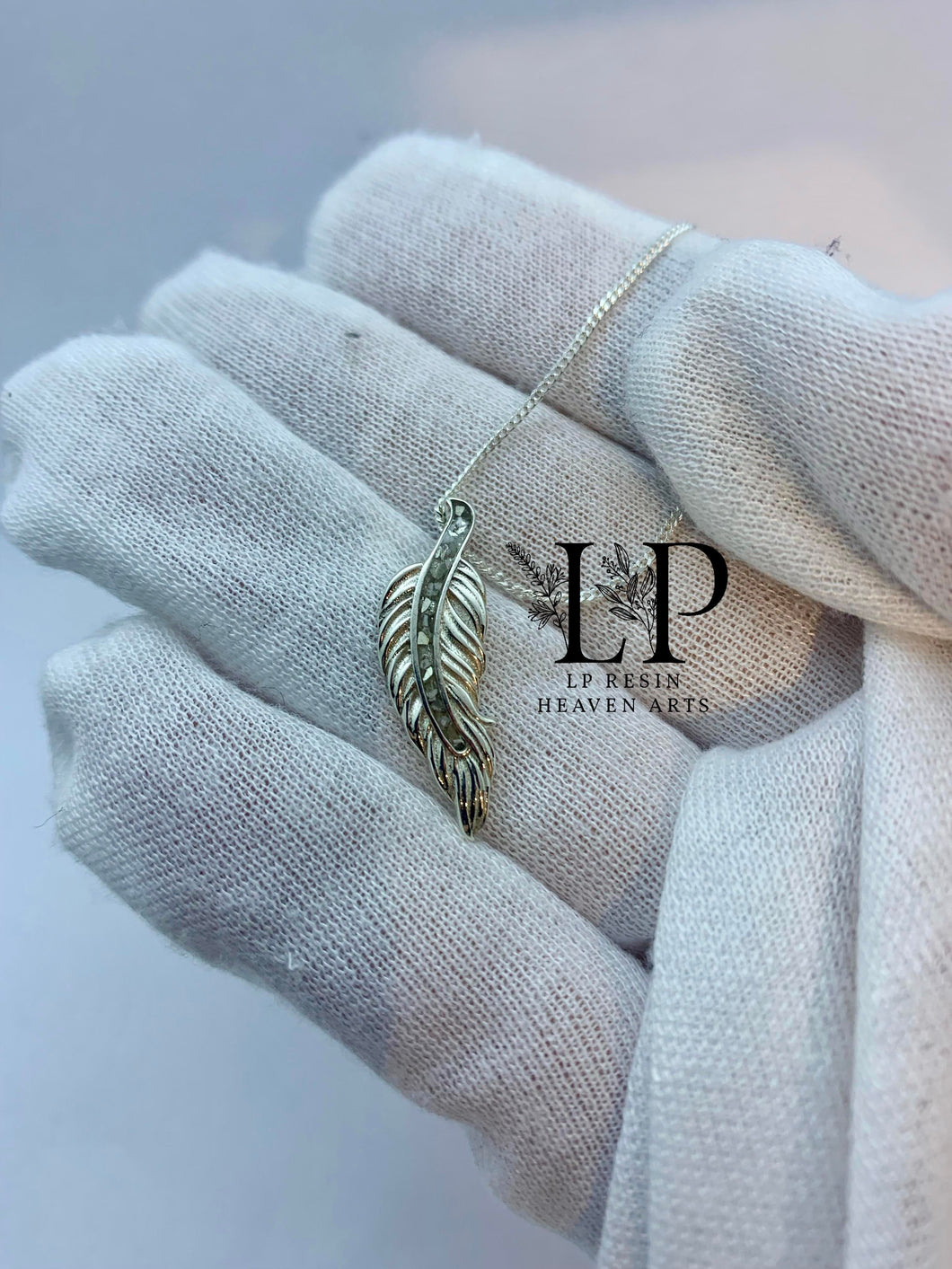 Feather pendant in silver